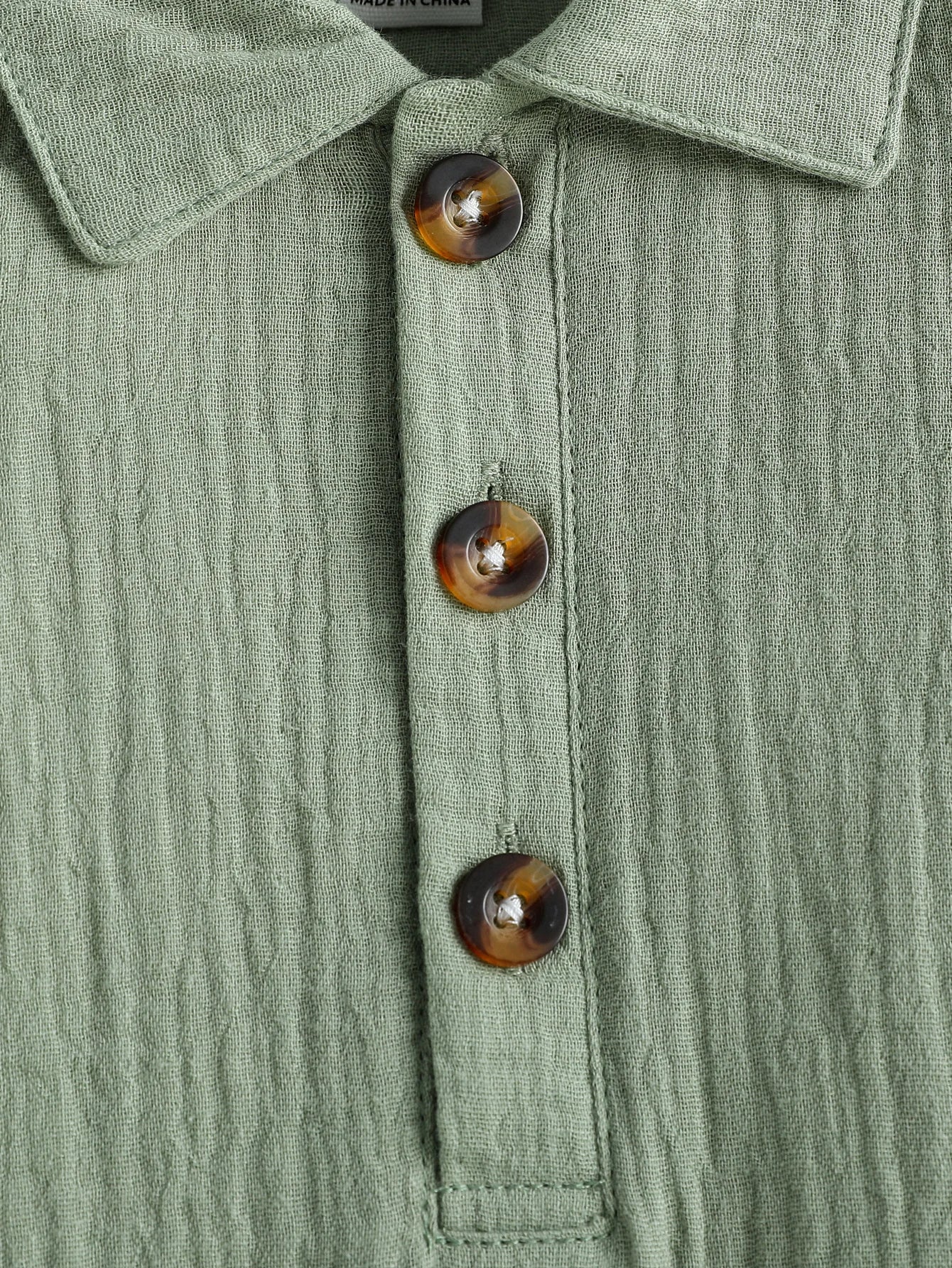 אוברול ניובורן - שקד